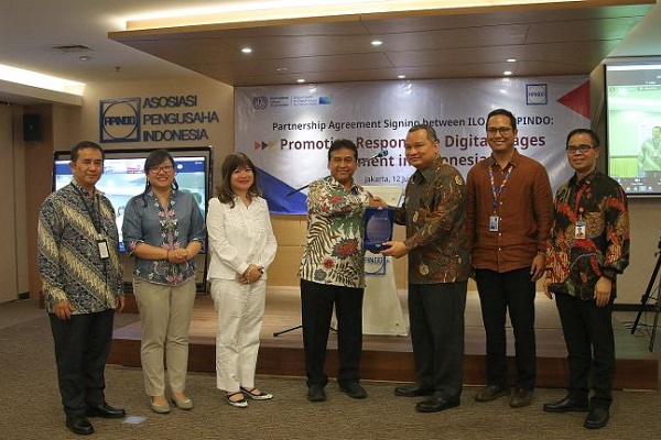 ILO and Apindo sign a partnership agreement to promote responsible digital wage payments in Indonesia